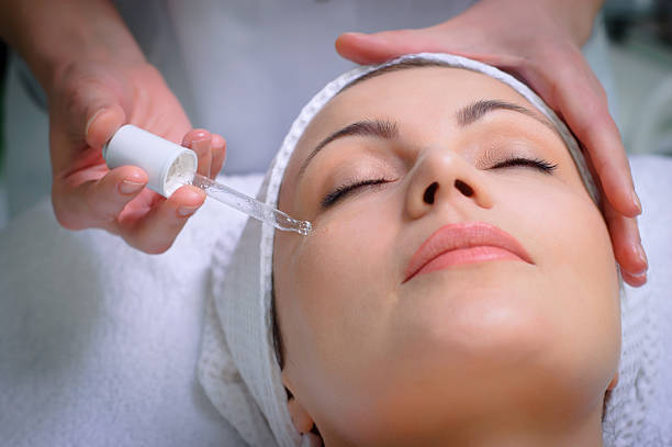 Woman following a morning skincare routine
